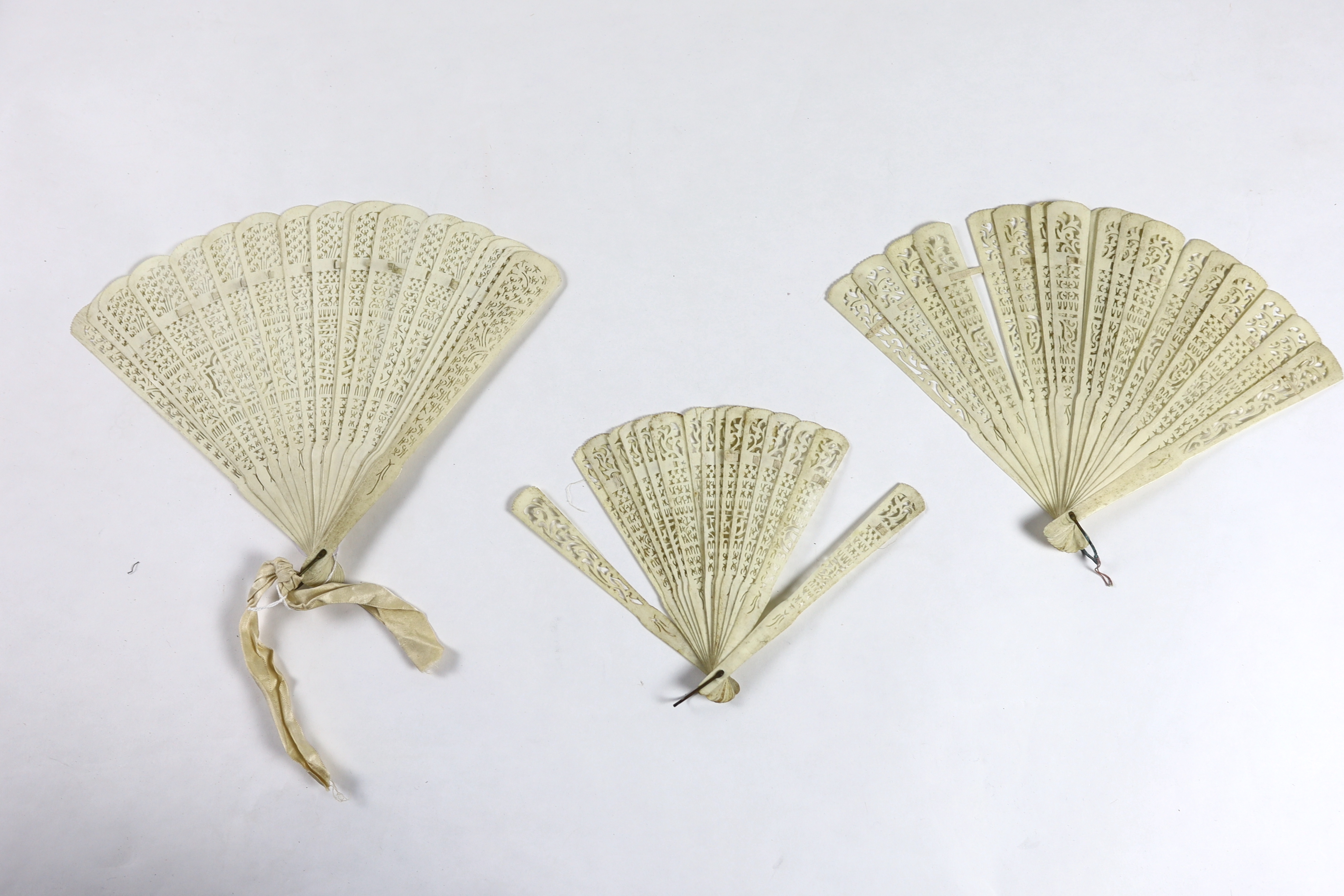 Three late 19th century 19th / early 20th century Chinese bone brisé fans